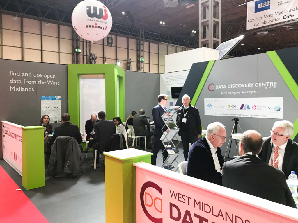 Picture of 3 hubs of different activities happening in the Data Discovery Centre feature stand at Traffex in 2019.